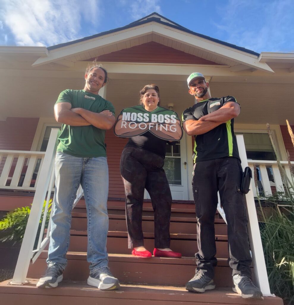 Malarkey Vista AR Roof Replacement in West Salem Moss Boss Roofing Salem Oregon Moss Boss Roofing owners standing with a homeowner after her completed roof replacement