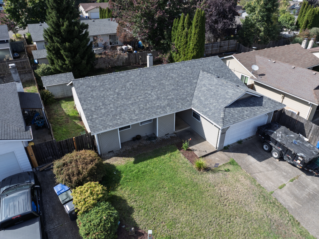Front aerial view of a completed Malarkey Vista AR Storm Grey roof in South Salem