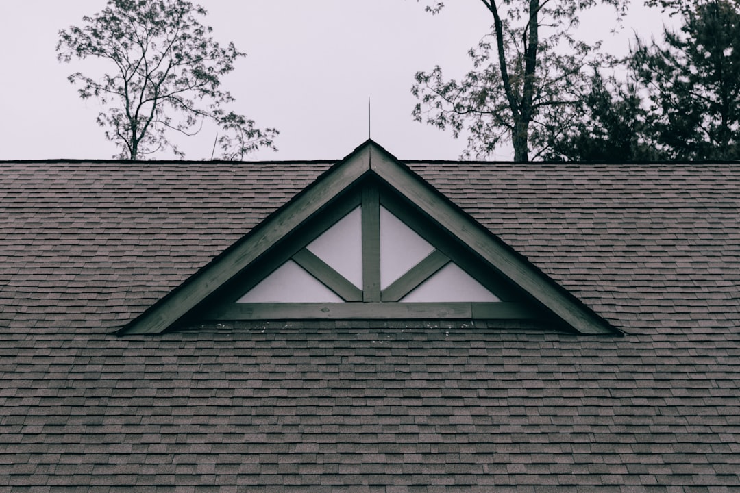 What Changes the Cost of a Roof Replacement in Salem, Oregon? Moss Boss Roofing Salem Oregon Asphalt-shingle roof with a small dormer on a residential home.